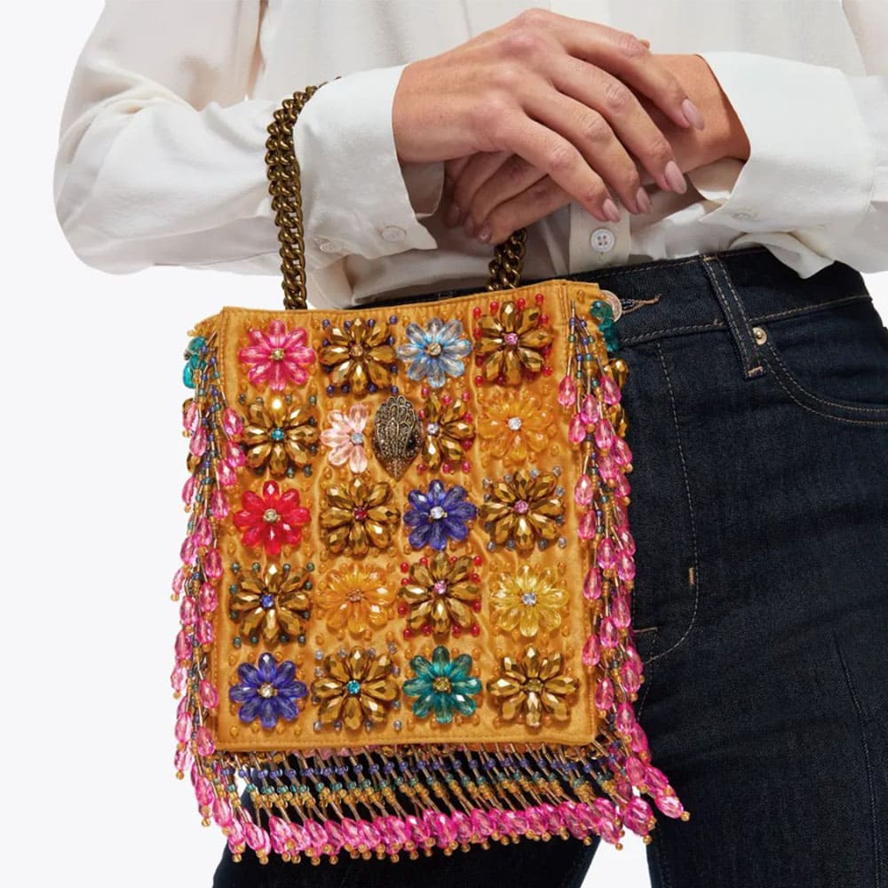 Cartera fiesta cadena perlas Kurt Geiger con flores joya foto 2