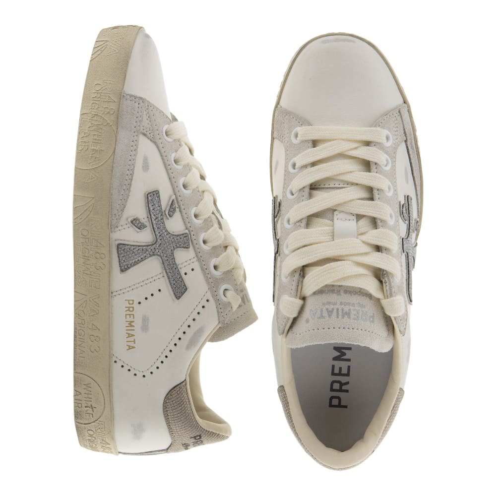 Zapatillas blancas mujer vestir Premiata | Elegancia casual foto 2